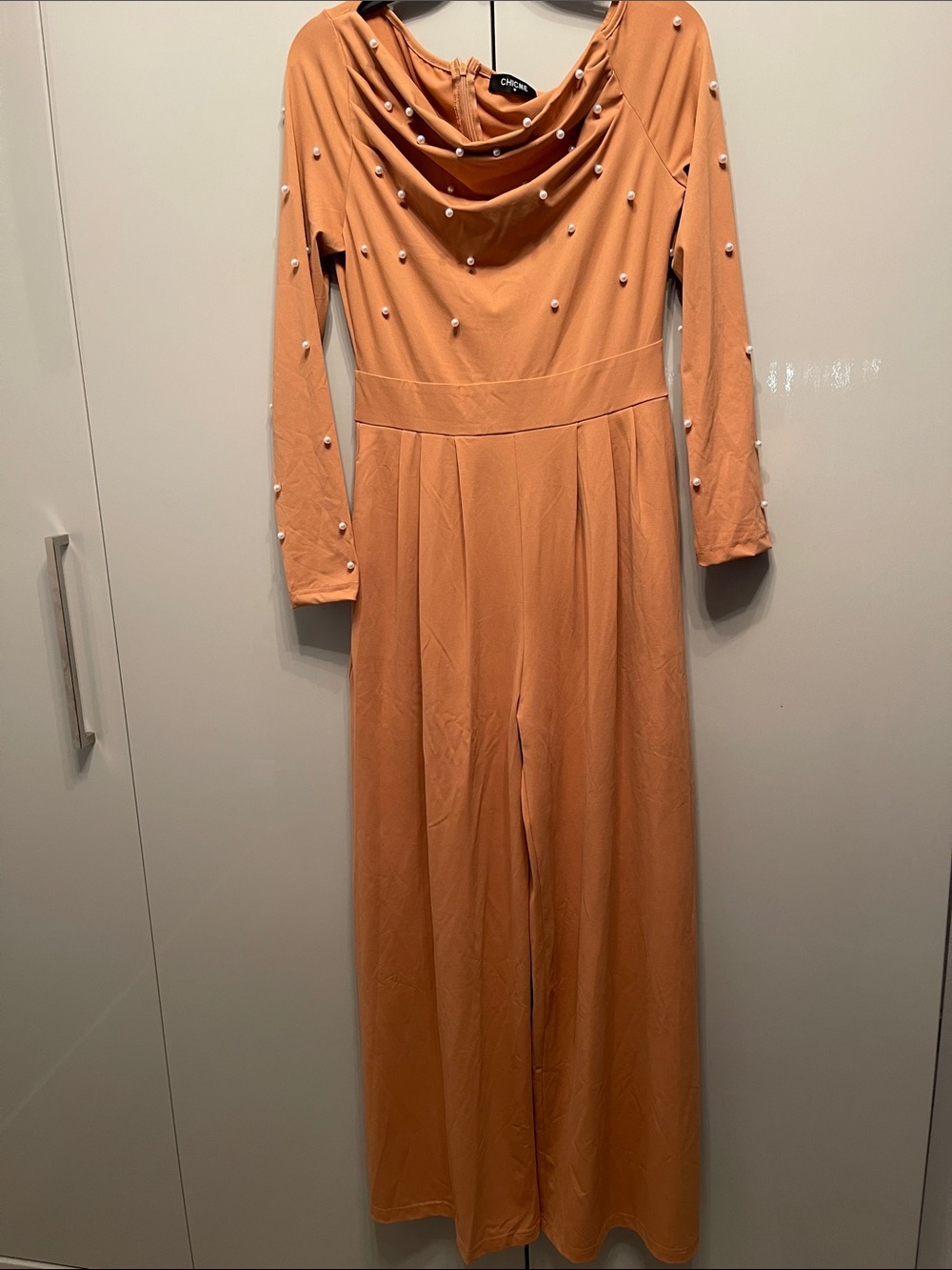 C/MEO Collective Peach Jumpsuit with Pearl Embellishments